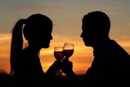 Couple cheerings wine