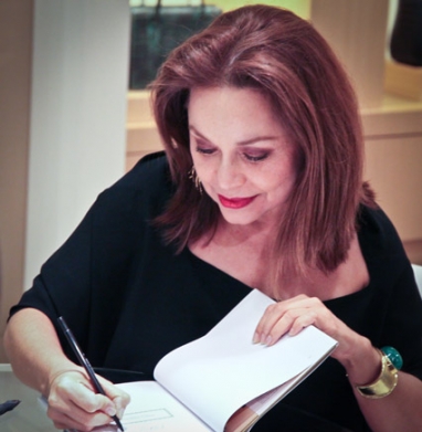 Nancy Gonzalez and son Santiago make special appearance at Neiman Marcus
